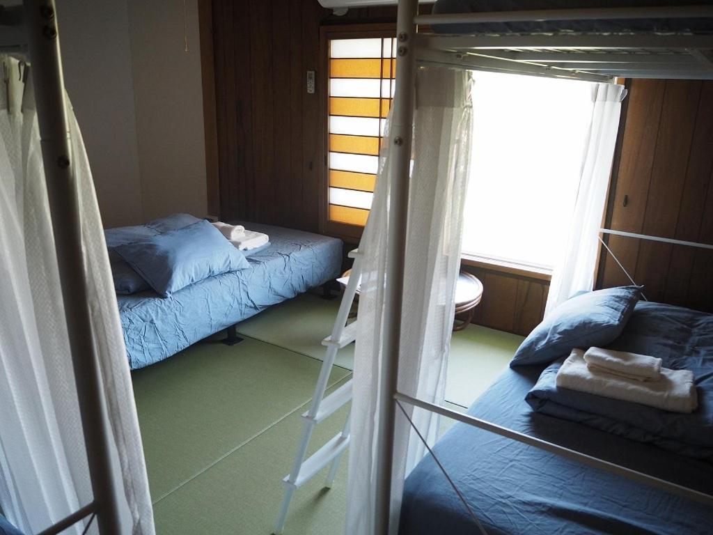 Guesthouse ＆ Beach Cafe Fuego Hyuga Bilik gambar